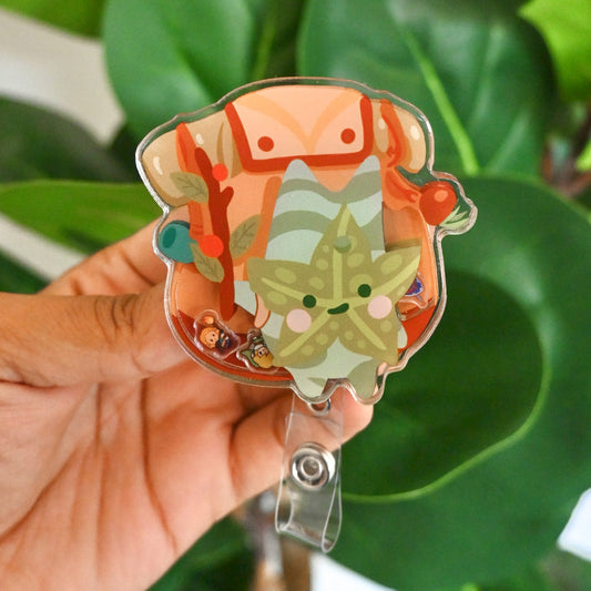 LEGEND OF ZELDA - KOROK WITH ITEMS ACRYLIC SHAKER BADGE REEL
