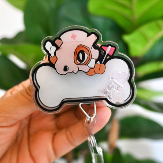 ORTHOPEDICS POKEMON THEMED ACRYLIC SHAKER BADGE REEL