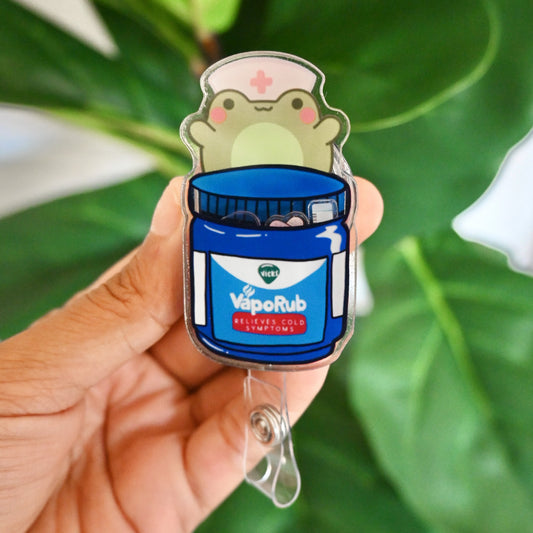 SANA SANA COLITA DE RANA ACRYLIC SHAKER BADGE REEL