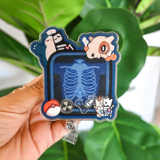 RADIOLOGY POKEMON THEMED ACRYLIC SHAKER BADGE REEL