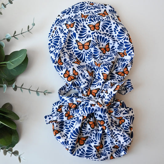 BLUE TALAVERA WITH MONARCH BUTTERFLIES SATIN LINED PONYTAIL SCRUB CAP
