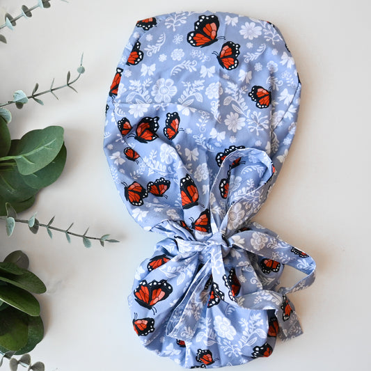 BABY BLUE BUTTERFLY TALAVERA SATIN LINED PONYTAIL SCRUB CAP