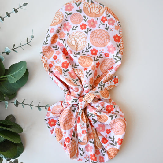 CONCHAS WITH FLOWERS SATIN LINED PONYTAIL SCRUB CAP