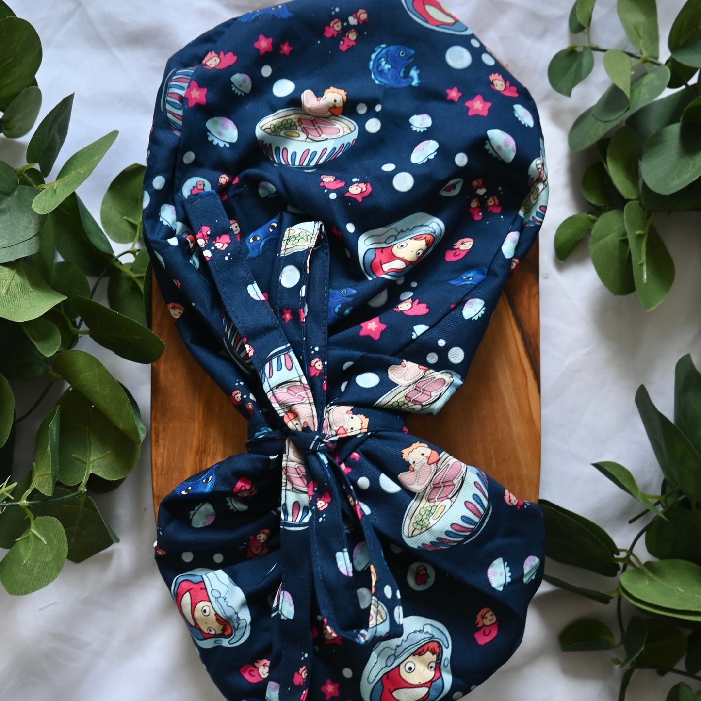 PONYO - DARK BLUE PONYO WITH SEA CREATURES SATIN LINED PONYTAIL SCRUB CAP