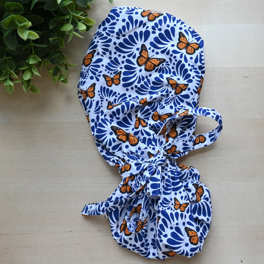 BLUE TALAVERA WITH MONARCH BUTTERFLIES SATIN LINED PONYTAIL SCRUB CAP